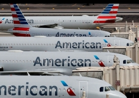 American Airlines купит